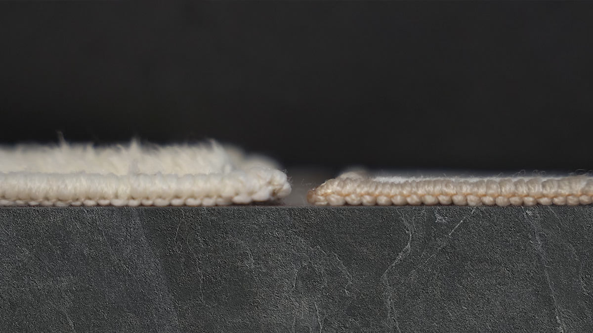 Video showcasing a soft black and cream zebra-pattern YIHOUSE rug with 2X thickness and easy machine-washable care.
