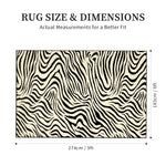 Rug size and dimensions chart showing a black and off-white zebra pattern rug with labeled measurements of 274cm / 9ft by 183cm / 6ft on a white background.